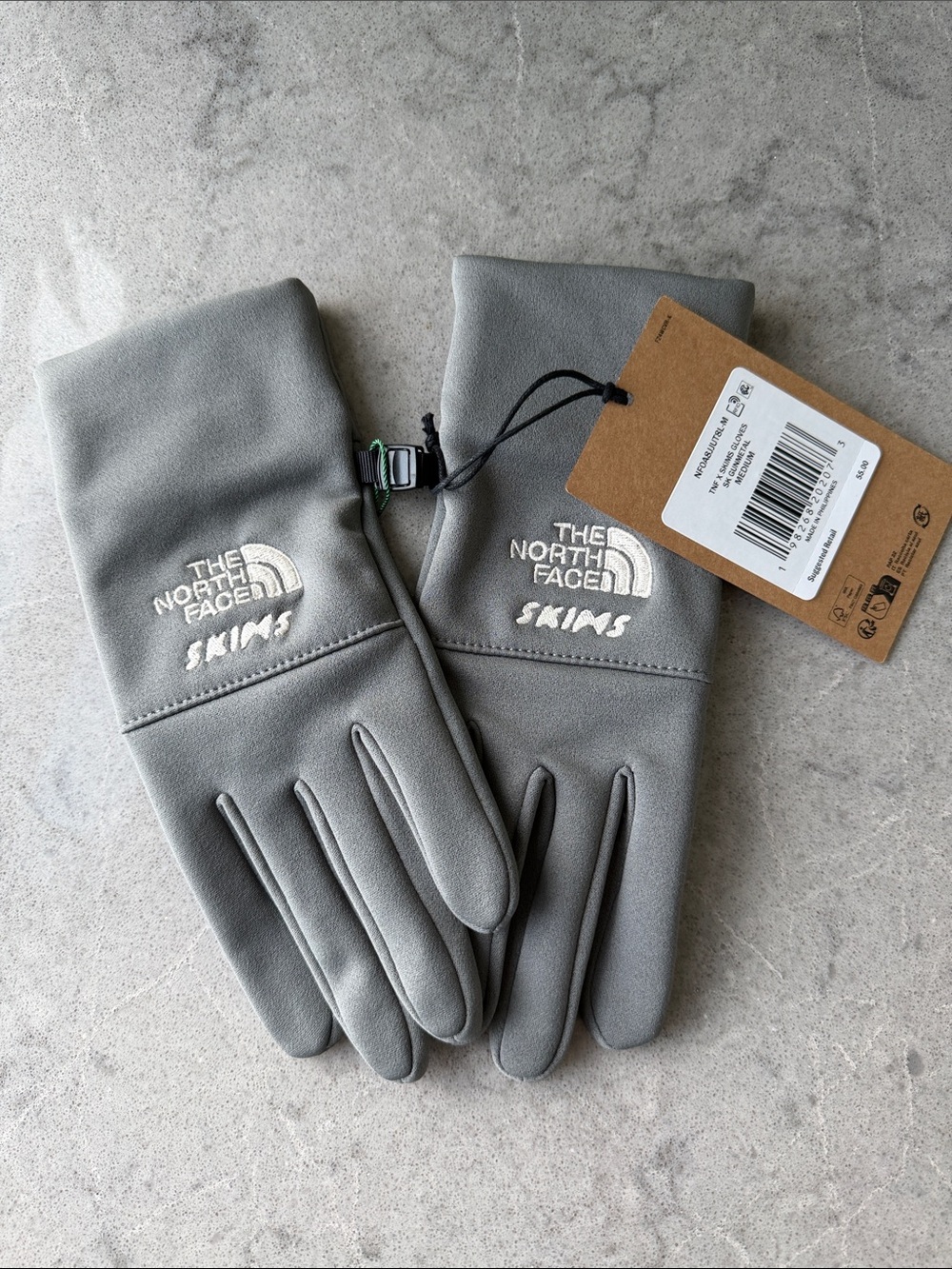 NWT The North Face x SKIMS gunmetal Gloves 
Size medium